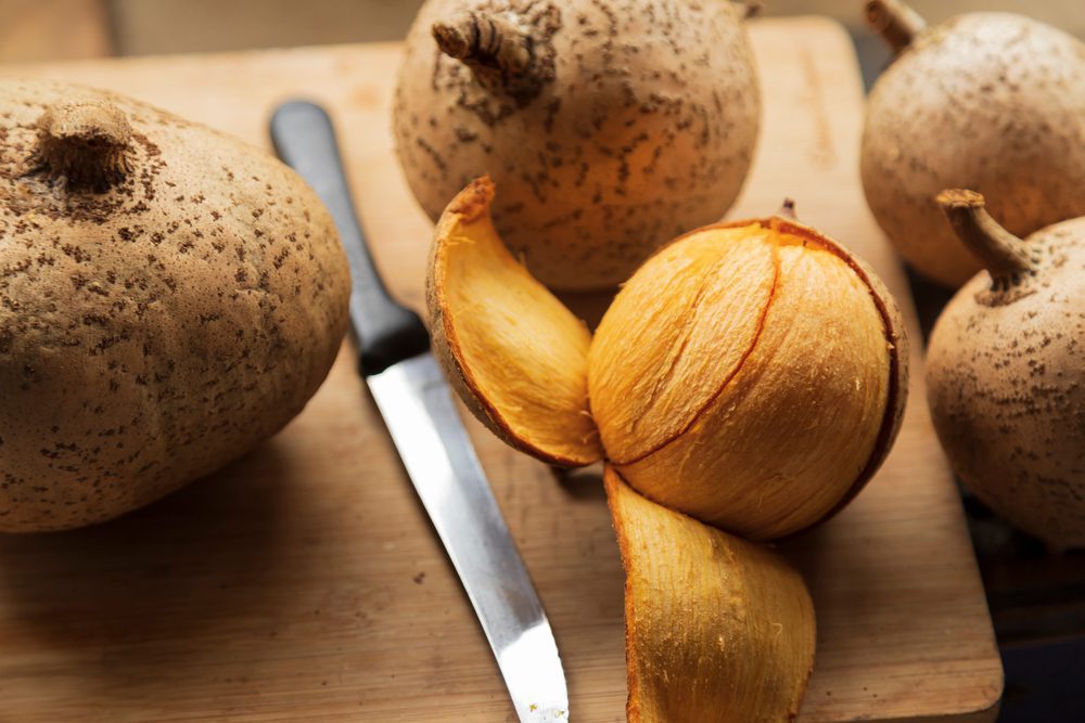 A,Partially,Peeled,Mammee,Apple,(mammea,Americana),Fruit,Among,Others