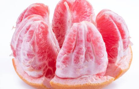 Peeled,Grapefruit,Slices,Isolated,On,White,Background.