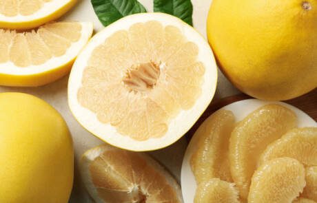 Concept,Of,Healthy,Breakfast,With,Ripe,Pomelo,On,White,Textured
